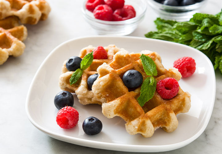 Wildflower honey, tea, and waffles for breakfast.