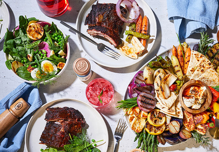 Homemade smoked BBQ ribs, grilled veggies, and a summer salad, BBQ & grilling recipes and spices.