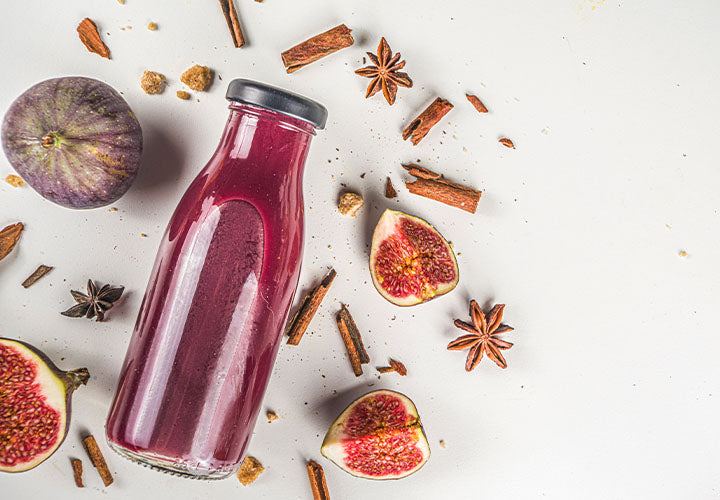Plum and fig smoothie with fresh cinnamon and star anise.
