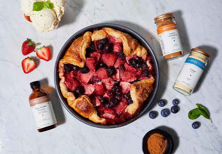 Delicious berry cobbler with vanilla ice cream and fresh spices.