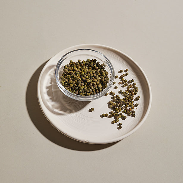 green peppercorns in a bowl